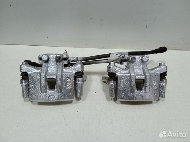 Суппорта тормозные аутлендер. Аутлендер хл скоба заднего суппорта. Суппорта тормозные аутлендер. Задние тормозные суппорта аутлендер 3. Суппорта тормозные аутлендер.