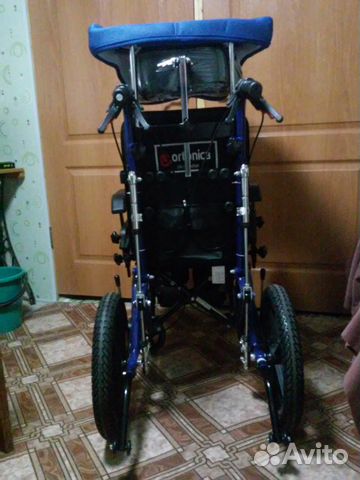 Детская инвалидная кресло-коляска