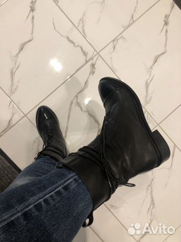 Новые кожаные сапоги