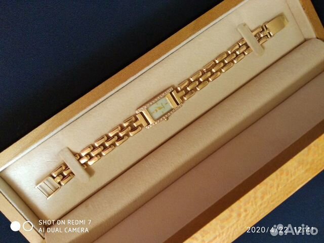 Золотые часы с браслетом и бриллиантами