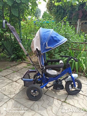 Детский трехколесный велосипед с крышей Детский трехколесный велосипед с крышей