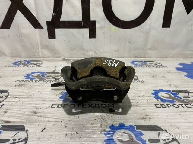 Суппорт передний правый Nissan Primera P12 QG18DE