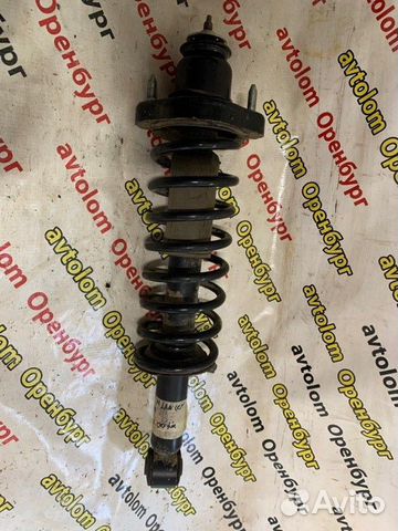 Стойка амортизатор задняя Mitsubishi Lancer 10