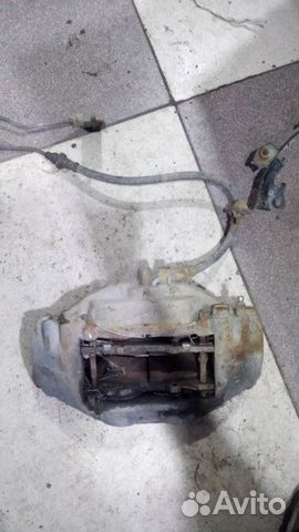 Суппорт тормозной передний правый Toyota Land Cru