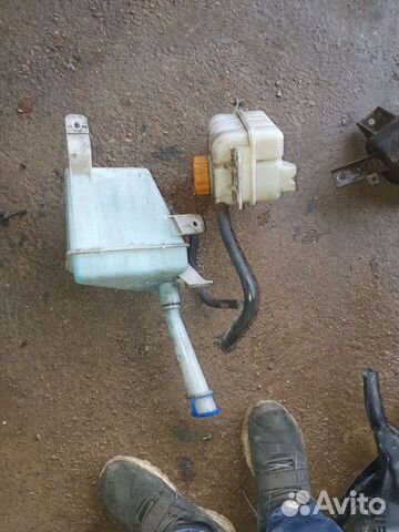 Бочек омывателя на шевроле авео 2011г