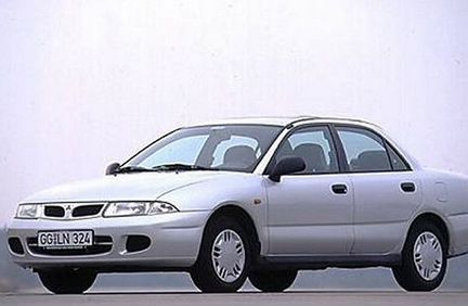 Крыло заднее правое четверть Mitsubishi Carisma DA