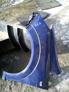 Крыло левое Опель Зафира Б. Синее